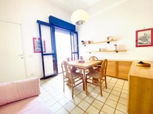 I Bagni 36 - Piazza Marconi Fronte Mare con Piscina - Immobil Relax