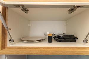 Apartamento 504 - Cena Living · Academia e Coworking no Centro de Curitiba p 4p.