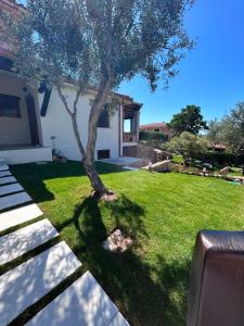 Villetta Tavolara Relax con giardino vicino al mare