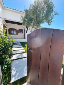 Villetta Tavolara Relax con giardino vicino al mare