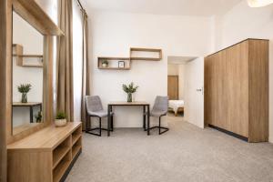 ALURE RESIDENCES 2 - 24h self check-in & private parking next to the apartment building included, CITY CENTER right on SNP Square in a quiet passage, new building, best deal in town