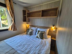 Chalet Bosrand 21 - Vrijstaand luxe 6-persoons chalet met beschut en ruim terras aan bosrand