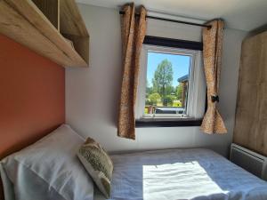 Chalet Bosrand 21 - Vrijstaand luxe 6-persoons chalet met beschut en ruim terras aan bosrand