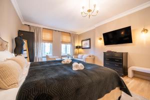 Apartamenty Pod Zegarem