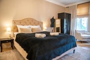 Apartamenty Pod Zegarem