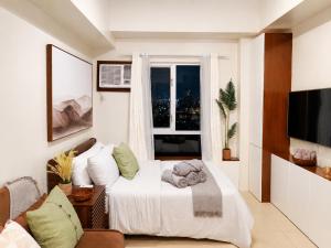 Cozy 29F Avida Riala IT Park Sea & City View