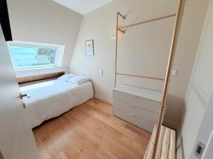 Escale élégante à la mer Duplex neuf en front de mer