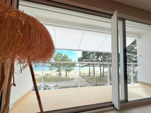 Escale élégante à la mer Duplex neuf en front de mer