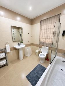 Spacious 3-Bedroom Apartment with Balcony, Prime Location, 5-Min Walk to Seafront