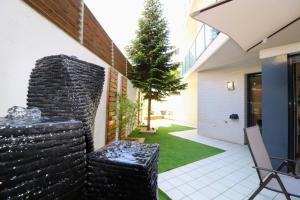 Oasis Fenals, Espectacular Terraza 90m, 3 Habitaciones, Piscina y Parking Privado