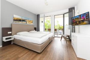 Ferienwohnung 1-24 im Deichhaus 1