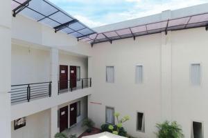 RedDoorz Plus Syariah at Polamas Andalas