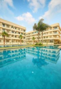 apartment with beach and pool