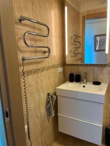 2 miegamuju kambariu apartamentai Palangos centre su vaiku zaidimo aikstele