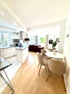 Smart Apartments - apartamenty z pięknym ogrodem i śniadaniami Ustronie Morskie