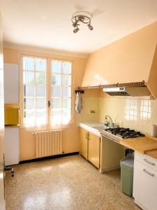 T2 lumineux avec balcon et vue dégagée - Côté olivier