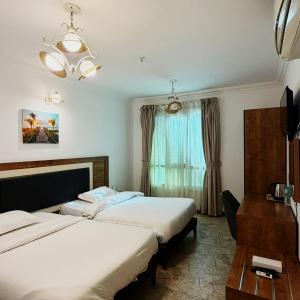 ريلاكس ان للشقق الفندقية Relax Inn Hotel Apartment
