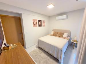 Apartamento novo com garagem coberta e internet