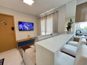 Apartamento novo com garagem coberta e internet