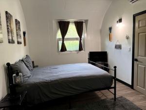 Peaceful Hobbit Hideaway with Stocked Pond, Goats & Fire Pits near Littleton, NC