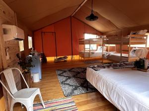 Spacious Deluxe Safari Tent with Fire Pit & BBQ Grill in Basinger, Florida