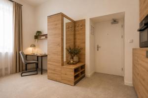 ALURE RESIDENCES 10 - 24h self check-in & private parking next to the apartment building included, CITY CENTER right on SNP Square in a quiet passage, new building, best deal in town