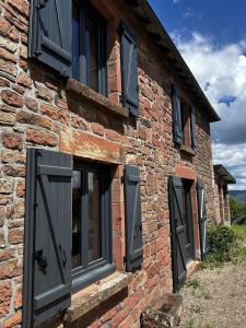 La jolie maison en grès rouge