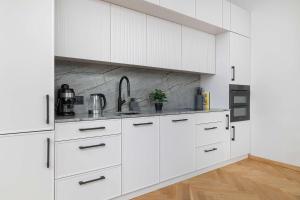 Nowoczesny Apartament z Klimatyzacją by Noclegi Renters