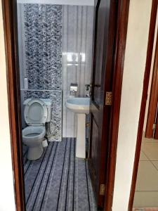 Rooftop Ocean Breeze 3BR Suites in Nyali Palm Terrace, Mombasa