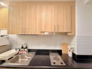 1BR Condo Near MOA and NAIA with Fast wifi and Netflix