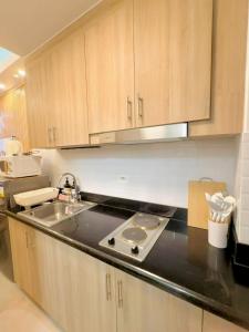 1BR Condo Near MOA and NAIA with Fast wifi and Netflix