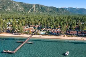Immerse yourself in Tahoes best from this lakefront community with beach access