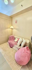 Petite Maison Rose Suite with Balcony at The Grass Residences