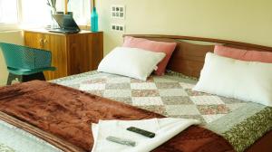 Vasu Inn - Rooms in Valparai