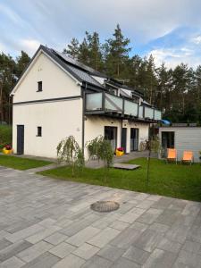Dom na Wczasowej Kaszuby z balią z jacuzzi i sauną