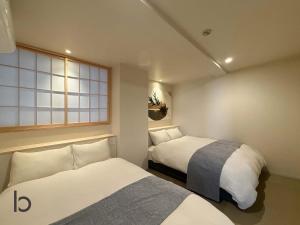 b hotel WAKO Ekimae BLD - Zen Stay Spacious Apartment