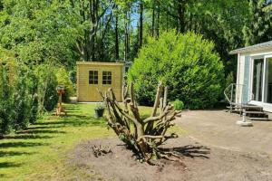 Chalet met Omheinde Tuin nabij Bos I Recreatiepark de Veldkamp