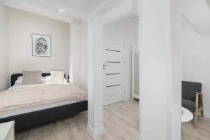 Przestronne Apartamenty Rodzinne z Miejscem do Pracy Zdalnej by Noclegi Renters