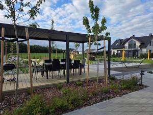 Calma - apartamenty z ogrodem blisko Energylandii
