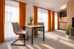 ALURE RESIDENCES 11 - 24h self check-in & private parking next to the apartment building included, CITY CENTER right on SNP Square in a quiet passage, new building, best deal in town