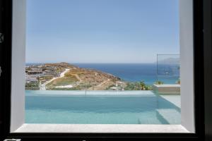 Ios Panoramic Sea view stylish suite with pool