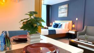 FREE Welcome Breakfast, BGC 1BR, 300Mbps Fiber, Steps to Mitsukoshi & Uptown, 19C