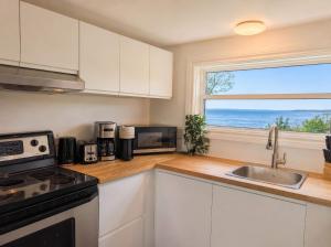 Condo 1 - Waterfront with SPA, Fireplace & Barbecue