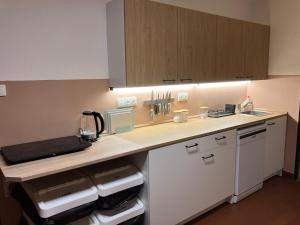 Apartmány ve sportovní hale
