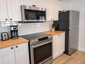 Condo #3 - 2 min Bord de leau Billard & Barbecue
