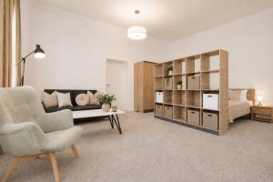 ALURE RESIDENCES 10 - 24h self check-in & private parking next to the apartment building included, CITY CENTER right on SNP Square in a quiet passage, new building, best deal in town
