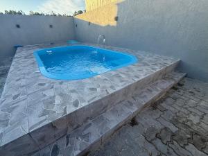 Casa com piscina em Capão da canoa