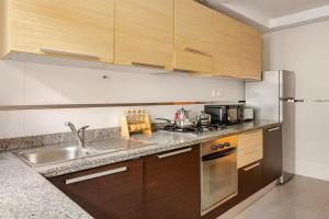 Appartement moderne 2 chambres, fibre optique, climatisation, proche Clinique Agdal