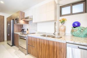 Condo con vista al arco, piscina infinity y spa