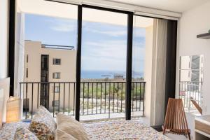 Condo con vista al arco, piscina infinity y spa